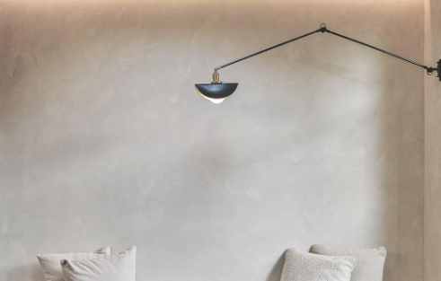Hand-applied lime paint wall with a wall lamp
