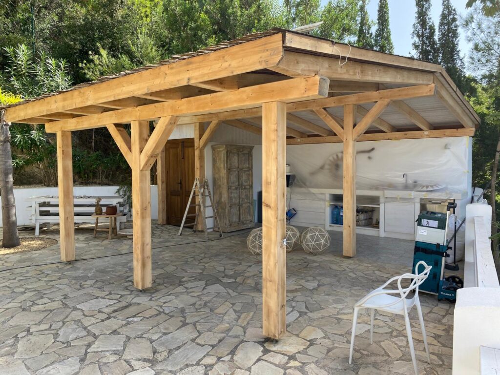 Timber pergola restored on site at a villa on the Costa Blanca by Mayra Studio