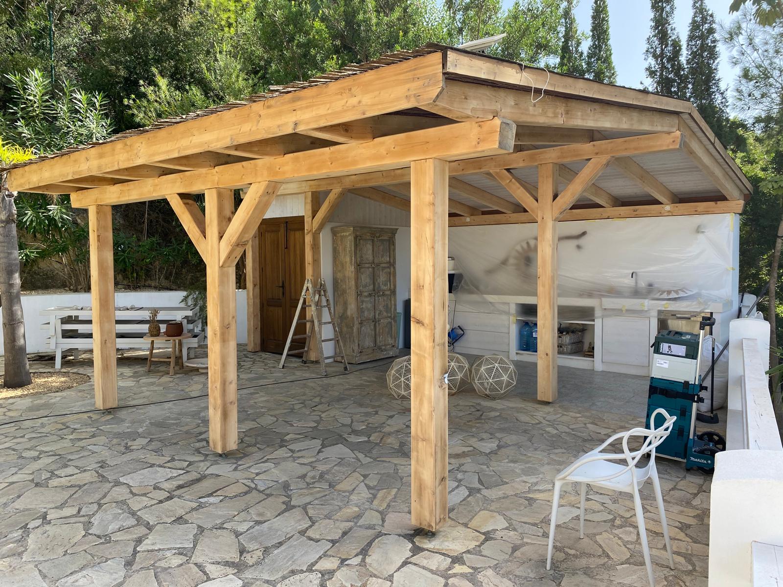Timber pergola restored on site at a villa on the Costa Blanca by Mayra Studio