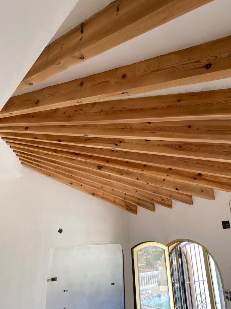 Detail of restored ceiling beams in Calpe